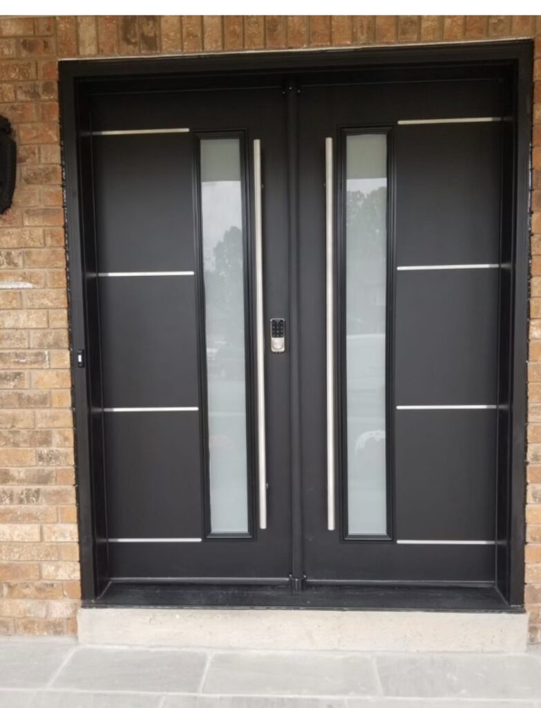 Black steel double entry door with frosted glass inserts, stainless steel accents and smart lock installed on Winnipeg brick home