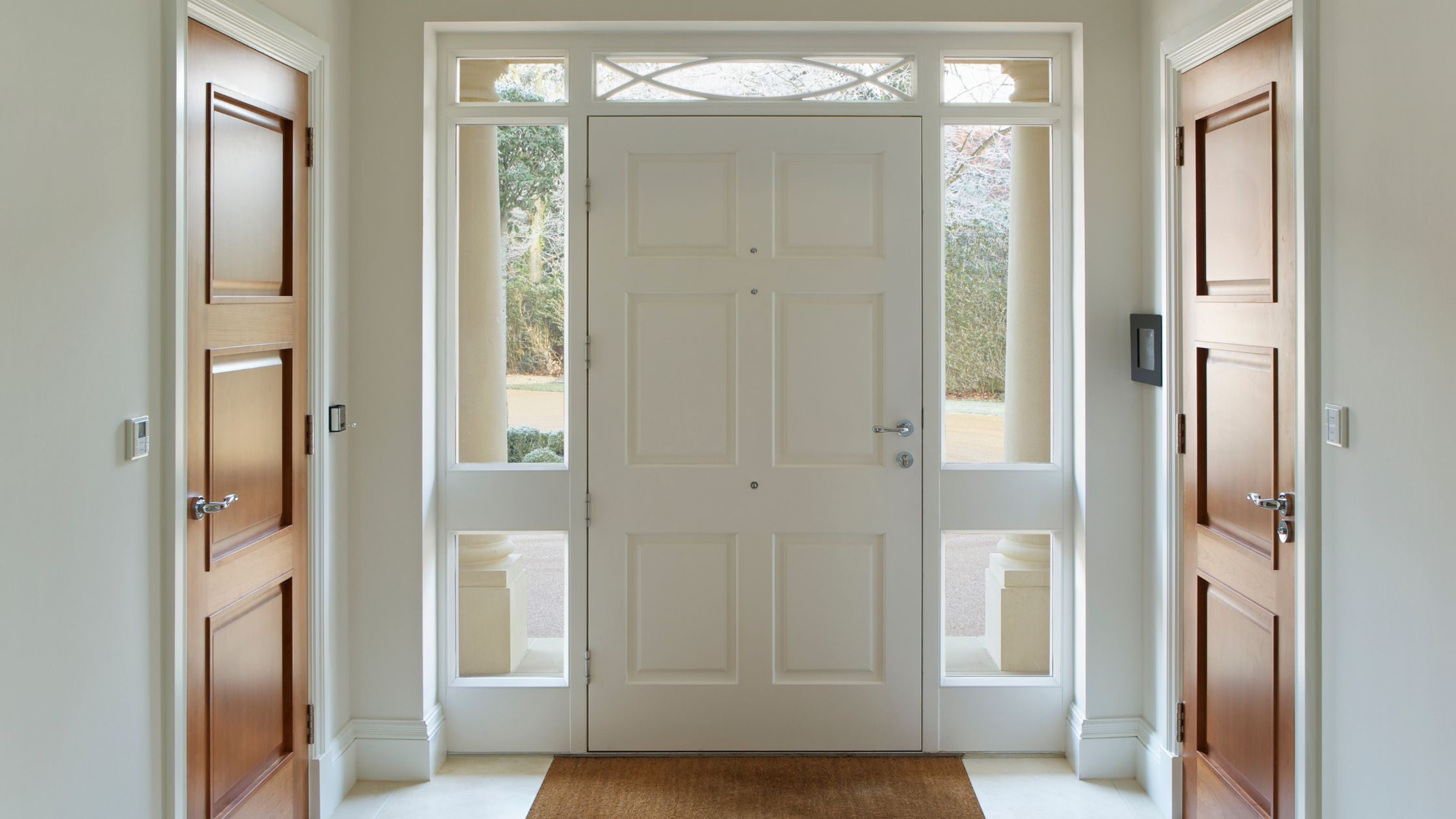 Modern entryway showcasing the benefits of installing a new front door in a Winnipeg home, improving energy efficiency, security, and curb appeal.